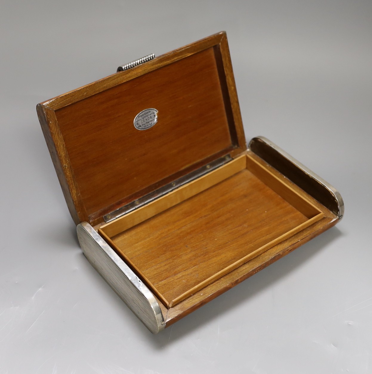 A Zendrini of Torino Art Deco style 800 standard white metal mounted burr yew cigar case.